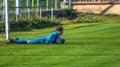 Teens playing football